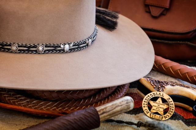 Custom Hat by O'Farrell in Santa Fe showing the  custom hat band by Jim Neely, Santa Fe.  Shot with Canon 5D SR and Canon 70--200 f4 lens.  Click on the image to enlarge.