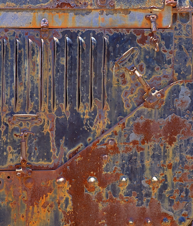 Rust on the hood of what I think was an old road maintenance machine at the Perris Railroad Museum.  Canon 5D MkII w/ Hasselblad Zeiss 180mm f4 and Rhinocam MF Adapter