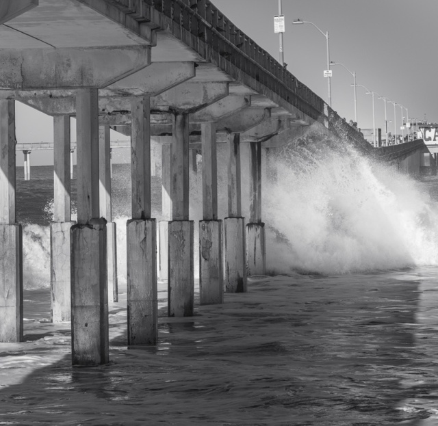 Another tighter shot of the water as it is quezzed under the pier.